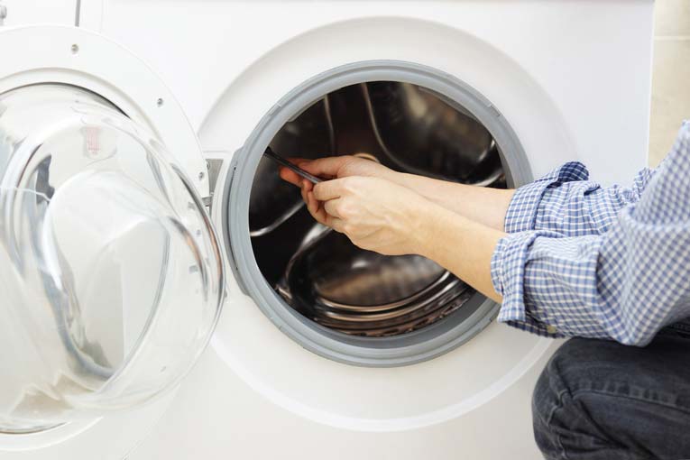washing machine repair in sharjah picture